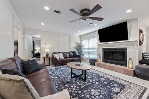 Cozy living room with large Tv