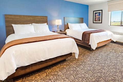 Stretch out on crisp linens and enjoy extra room to relax.