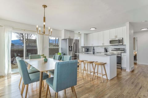 Bright and modern dining space with mountain viewsโperfect for shared meals and memories!