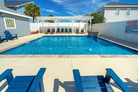 Inviting communal pool, perfect for a refreshing dip and relaxation.