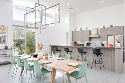 Stunning interior design, a chic dining area, and chef's kitchen. (Polo Villa 8)