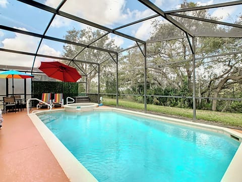 - Splash into fun in your own private pool and unwind in the bubbly spa
- Bright umbrellas and striped loungers bring out that festive vacation vibe
- Lounge in peace with a beautiful green backdrop and no rear neighbors in sight