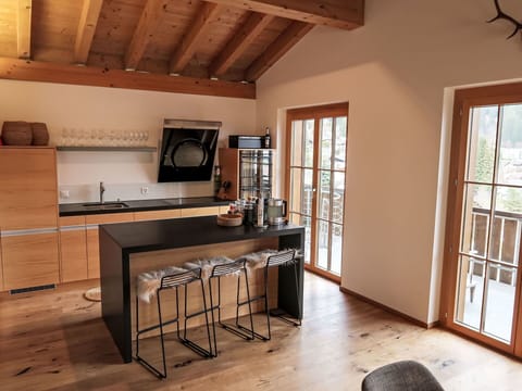 Furniture, Flooring, Interior Design, Wood, Kitchen, Floor, Chair, Countertop, Ceiling, Table