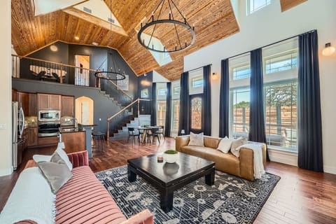 Spacious living area with comfortable couches, perfect for gathering with friends and family.