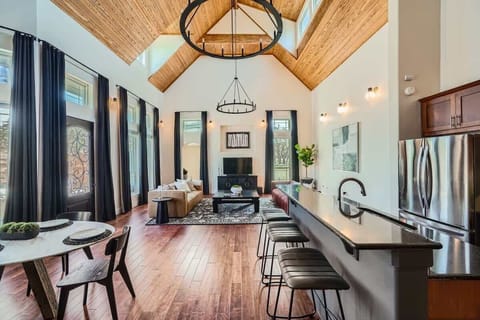 A bright, open-concept kitchen flows seamlessly into the dining area for effortless entertaining.