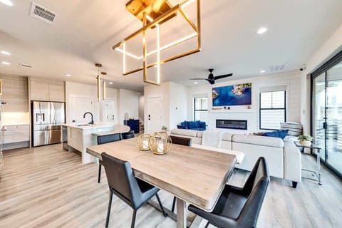 The open-concept dining area flows seamlessly from the kitchen, making group meals a breeze.