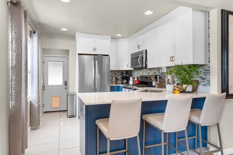Modern kitchen with breakfast bar + updated appliances