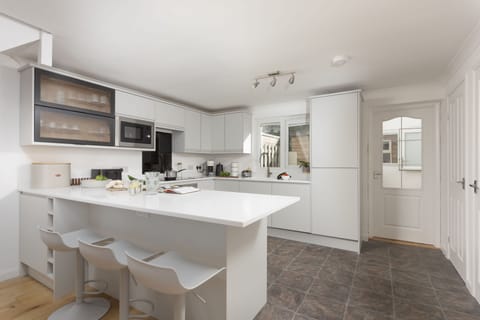 Poldreth, Porthtowan. Ground floor: The sleek, modern kitchen is superbly equipped