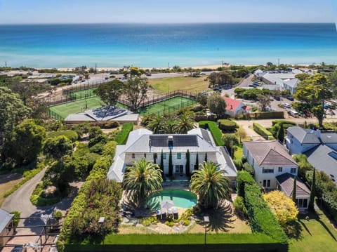 Your own private resort, with a solar heated resort-style lagoon and located directly across from the Mount Martha Community Tennis Courts and South Beach