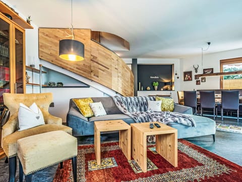 Furniture, Interior Design, Couch, Flooring, Floor, Wall, Living Room, Room, Wood, Ceiling