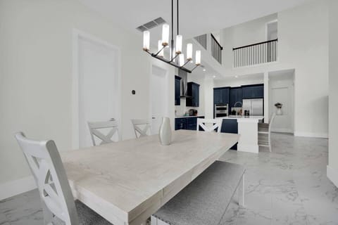 Roomy dining table perfect for group meals, games, and quality time.