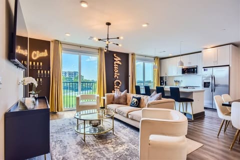 Living Room: Vibrant decor and sweeping views await in this stylish Music City oasis!