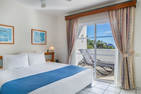 Inviting bedroom  where morning views and fresh air await.