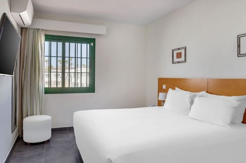 Cozy bedroom retreat with crisp linens and tranquil decor to ensure a peaceful slumber.