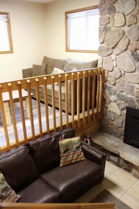 Relax upstairs in a cozy nook beside the stone hearth.