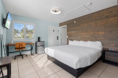 Amenities include a smart TV with cable, a mini fridge, a microwave, and a coffee maker.
