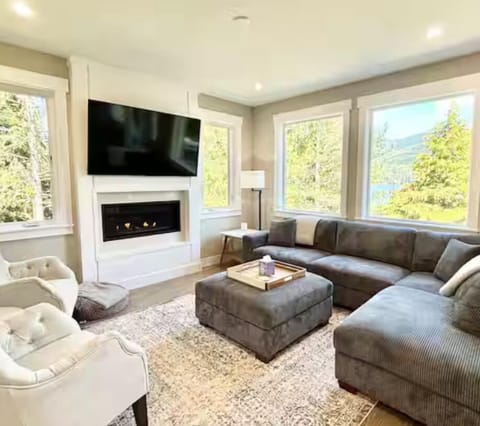 Comfortable seating in main living space. Smart TV and gas fireplace.