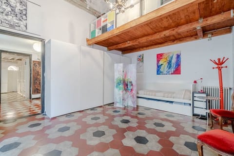 In the heart of Porto Antico, on Via San Luca, a stunning 200 sqm historic apartment in a 18th-century building. With 6-meter-high ceilings and elegant spaces, it accommodates up to 7 guests. Located in a lively pedestrian area full of history, shops, an Apartment in Genoa