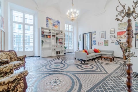 In the heart of Porto Antico, on Via San Luca, a stunning 200 sqm historic apartment in a 18th-century building. With 6-meter-high ceilings and elegant spaces, it accommodates up to 7 guests. Located in a lively pedestrian area full of history, shops, an Apartment in Genoa