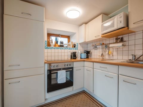 Kitchen Appliance, Kitchen, Countertop, Major Appliance, Cabinetry, Interior Design, Wood, Flooring, Kitchen Sink, Home Appliance