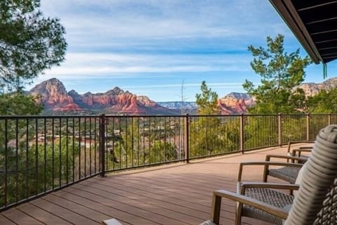 Upper deck - walk out from living room w/ sitting areas, hot tub, grill, hot tub