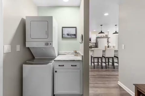 Laundry area with laundry pods provided