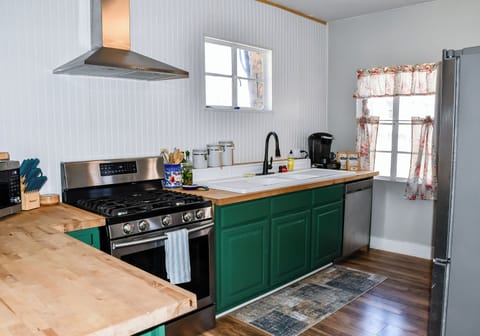 stove/oven, microwave, dishwasher, full fridge