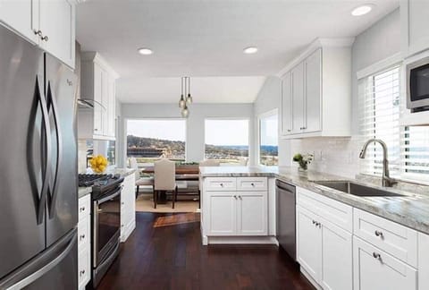 Fully-stocked kitchen with a wine fridge