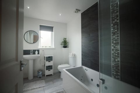 Clean and modern bathroom with fresh towels and essentials