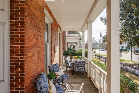 shared space covered patio with outdoor seating 