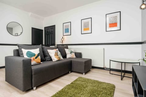 Living Area:
A comfortable living space with cosy seating, a Smart TV with Netflix, and a sofa bed for extra guests — perfect for relaxing after a day at Anfield or exploring Liverpool.