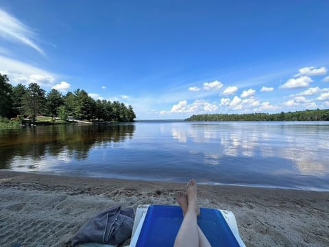 100% private! 400',  sandy bottom with gradual grade. Boat launch to the left.