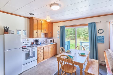 Cozy, well-equipped kitchen with all the essentials for home-cooked meals—perfect for relaxing days.