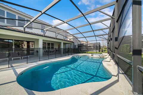 - Splash into the private screened pool with attached spa jets
- Lounge on poolside chairs or dine outdoors under covered patio
- Family-friendly safety gate adds comfort for group stays