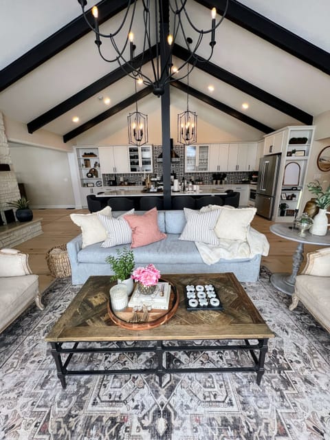 The large kitchen area includes a cozy seating area with amazing views.
