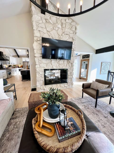 The crown jewel of the great room is the double sided fireplace.