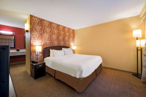 Unit with 1 King bed. Exact unit will be assigned upon arrival. Views, colors, and decor may vary.