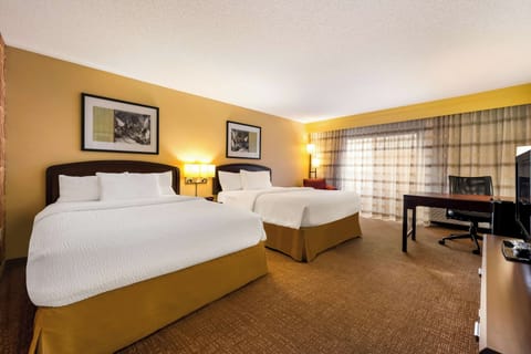 Unit with 2 Queen beds. Exact unit will be assigned upon arrival. Views, colors, and decor may vary.