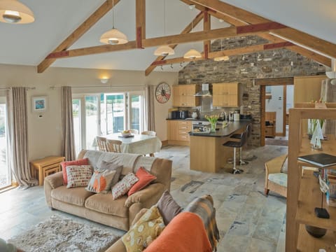 Open plan living area with French windows