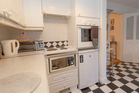 Aughrim Holiday Village No. 14. Aughrim holiday village.Bright kitchen with modern appliances. Tiled floors.