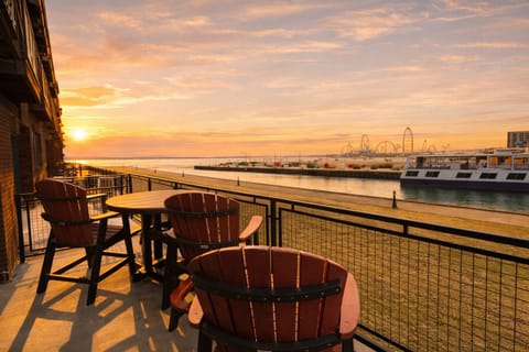 Step onto your private patio and take in the stunning sights of Lake Erie and downtown Sandusky. Relax in Adirondack chairs as you watch ferries glide by, with the cool lake breeze setting the perfect mood for morning coffee or evening drinks.