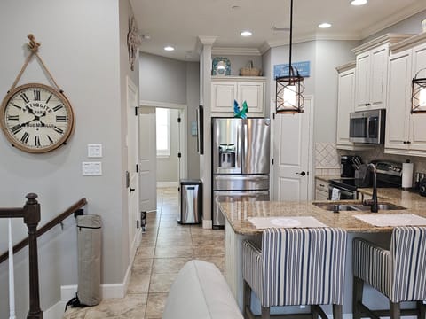 MAIN LEVEL (2) Areas- Kitchen, Dining, Living, Bedroom (#4), Bath (#3) Balcony