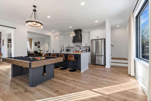 Experience luxury in this stunning Nashville rental. Enjoy spacious layouts, a chic game room, and a stylish living area—perfect for game nights or relaxing. Ideal for bachelorette parties or family reunions!