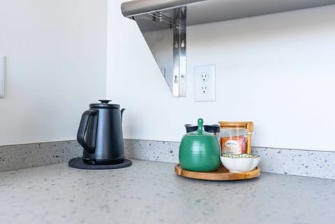 Enjoy cooking in this sleek, modern kitchen with all essentials provided.