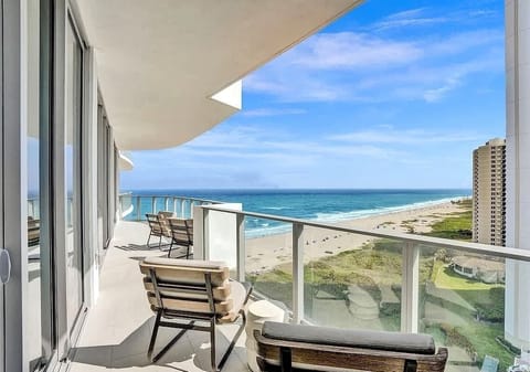
Spacious balcony with sweeping ocean and beach views