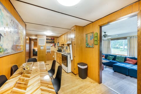 Fun wood vibes in the blended dining area and kitchen space