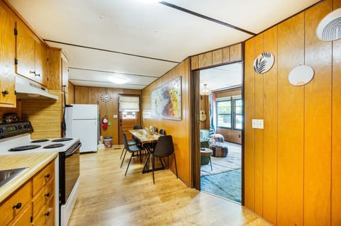 Blended kitchen and dining spaces for ease of access