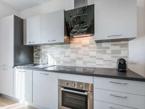 Kitchen, Countertop, Cabinetry, Kitchen Appliance, Major Appliance, Flooring, Interior Design, Drawer, Home Appliance, Floor