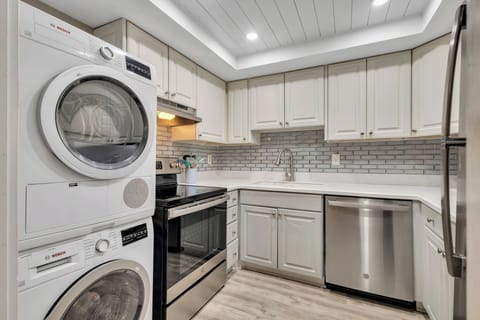 The fully equipped kitchen is perfect for cooking and meal prep, featuring all the essentials for your culinary needs.