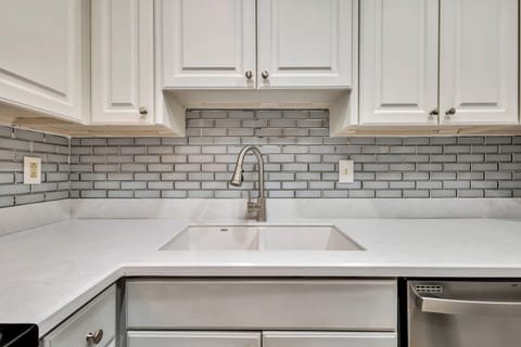 The fully equipped kitchen is perfect for cooking and meal prep, featuring all the essentials for your culinary needs.